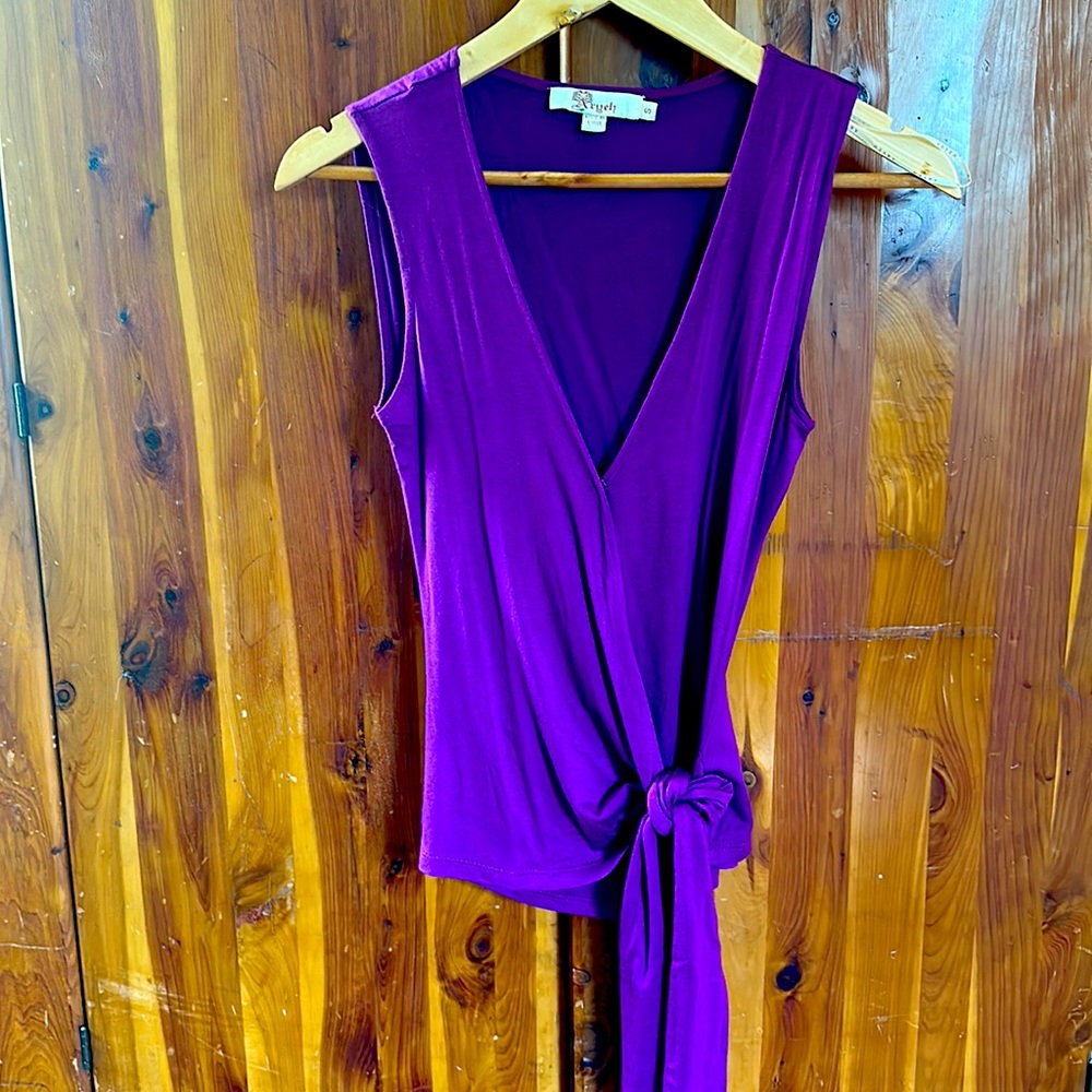 Aryeh wrap top in size small.